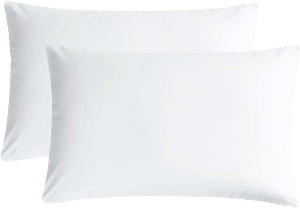 Two white Standard size pillowcases fitted over pillows, shown side by side on a plain white background